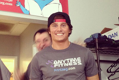 Adam with a custom shirt printed for Anytime Fitness